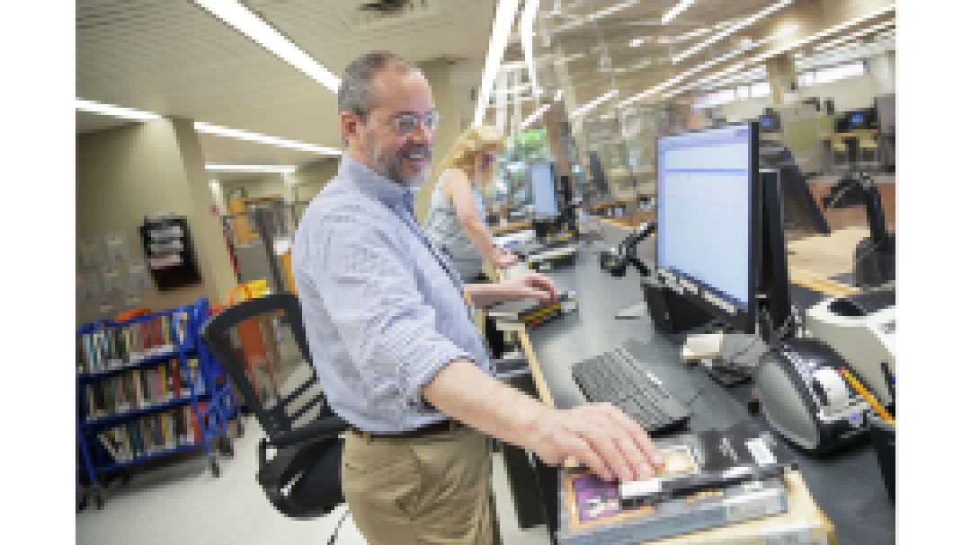 Todd Burks working at the library